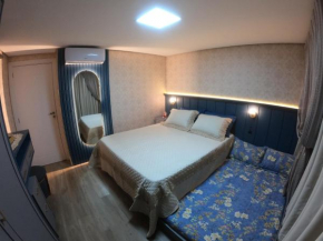 5 min Centro-Estacionamento-Apto 2 dorm-6 pessoas-Ar Cond-Wifi